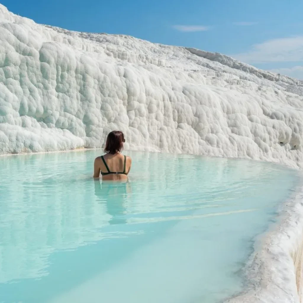 Tourists relaxing in Pamukkale thermal pools
