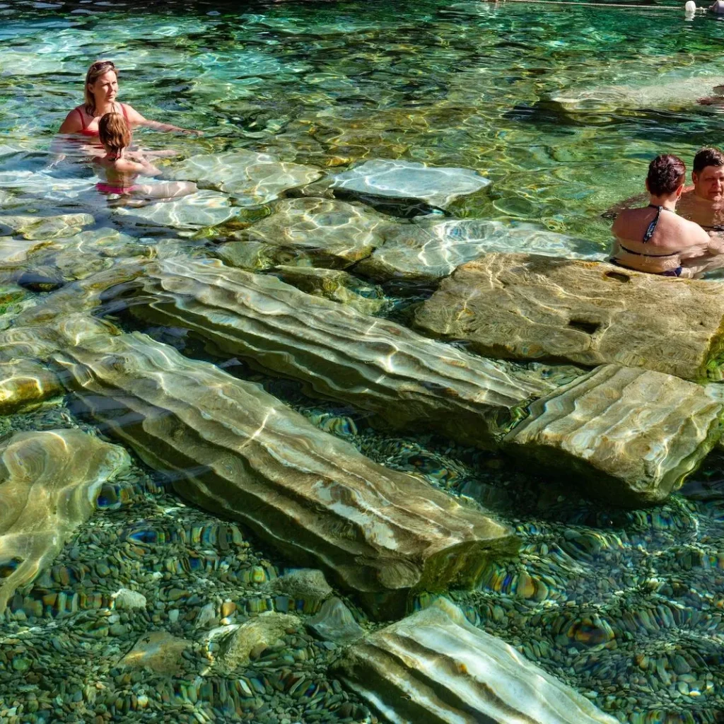 Visitors relaxing at Pamukkale Antique Pool
