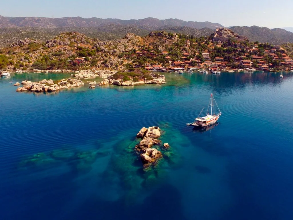 Sunken City in Kekova ruins viewed from a boat tour in turquoise waters